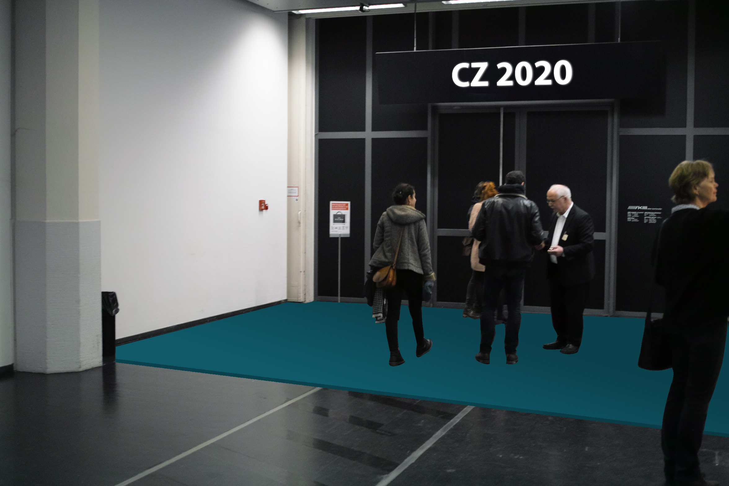 In front of the entrance to the exhibition "Critical Zones" there is a differently coloured floor, which has a different texture than the normal museum floor.