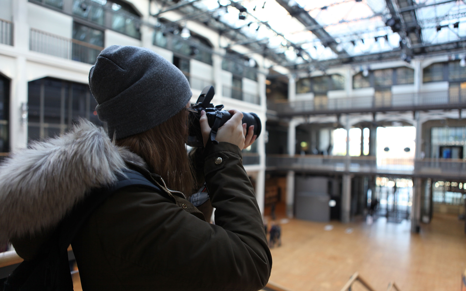 Students documenting the GLOBALE. Student is filming the ZKM. 