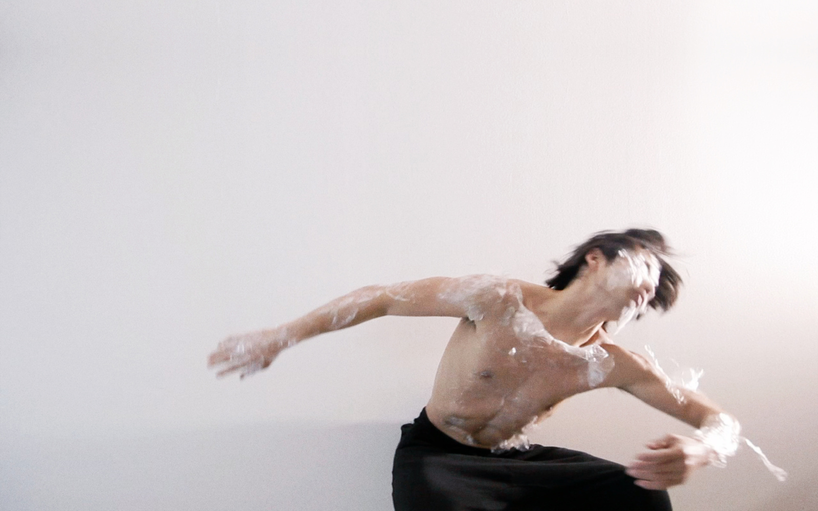 A dancer wrapped in plastic wrap
