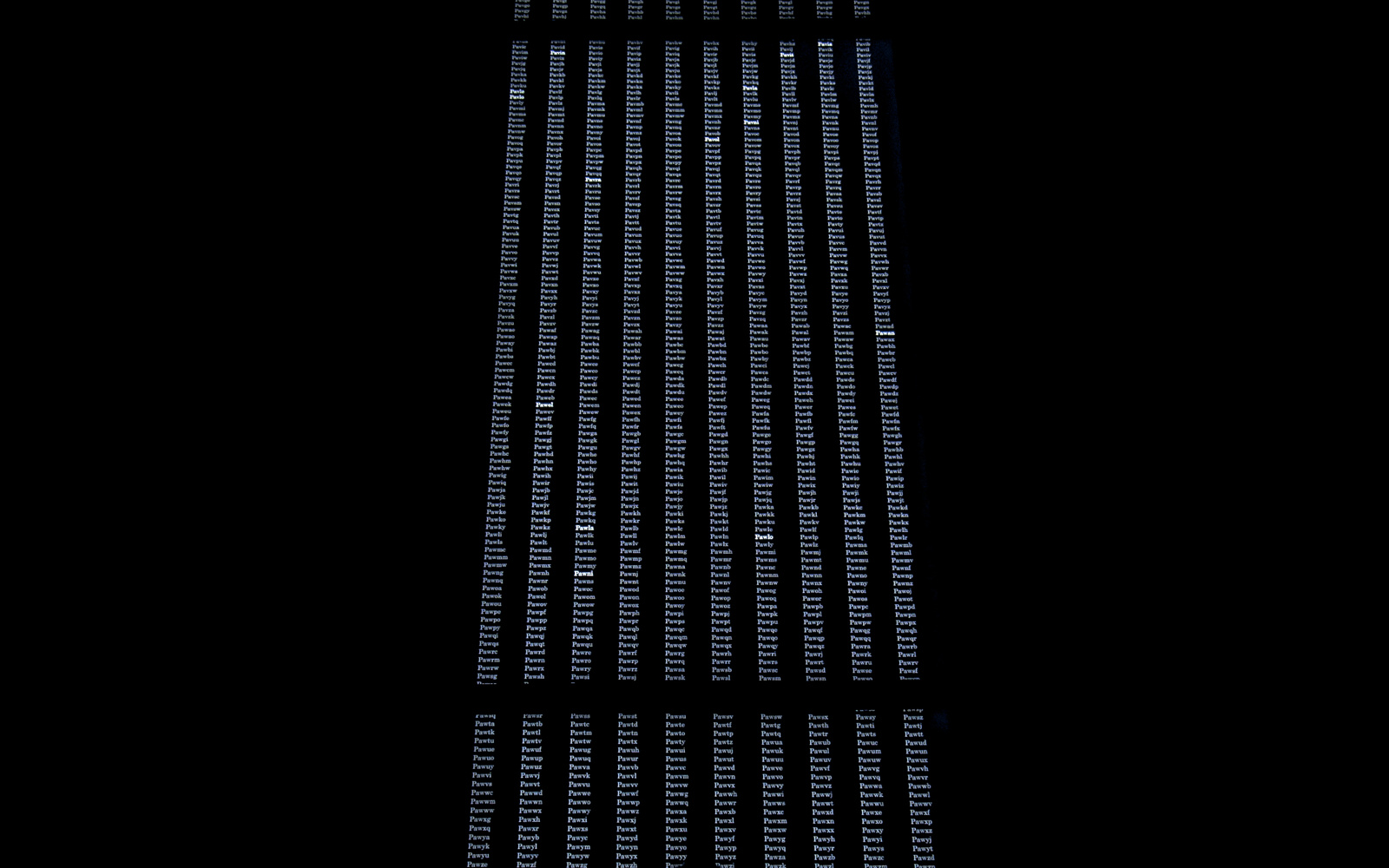 The photo shows the shadow of a person in front of a large data wall.