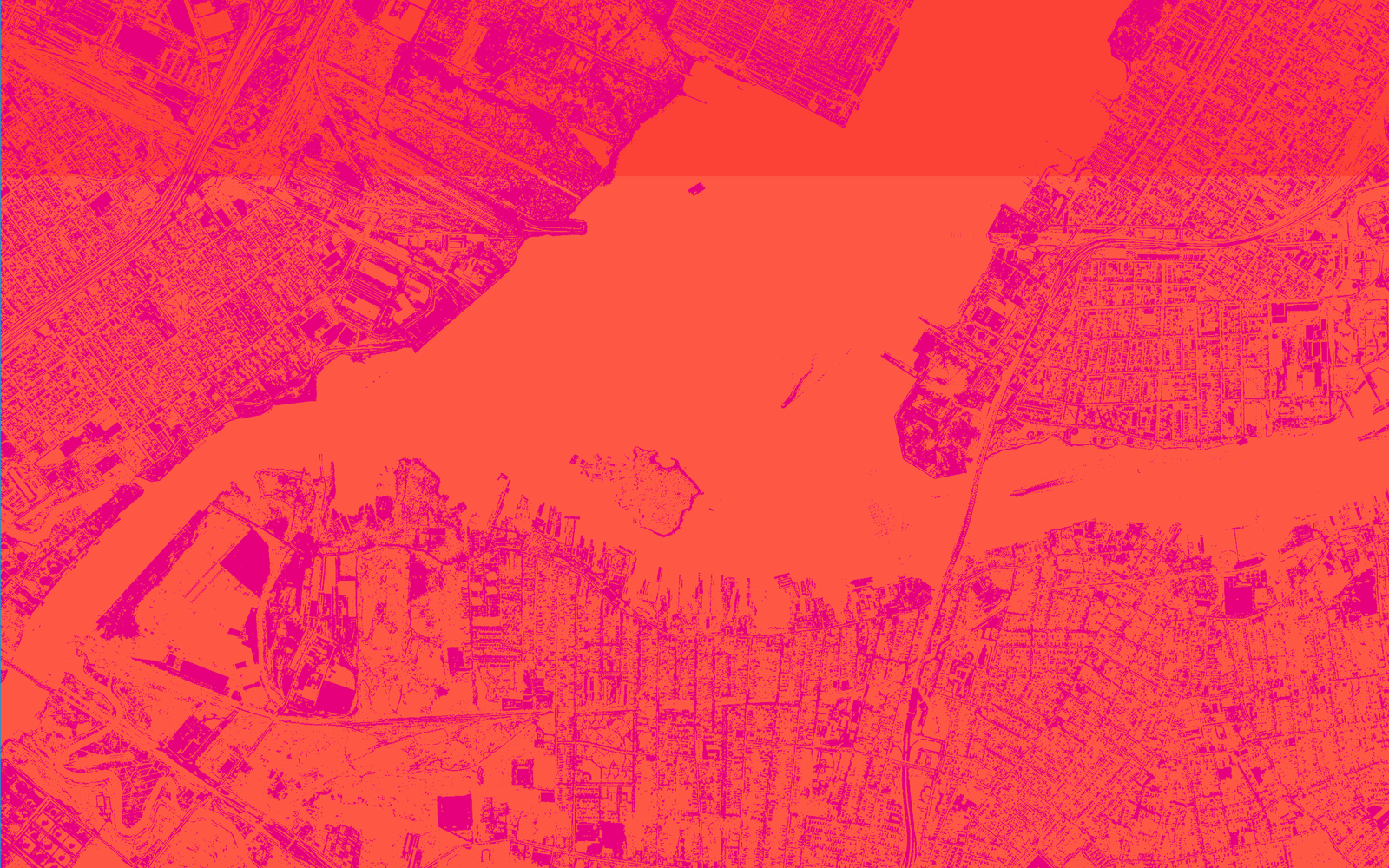 From the bird's eye view you can see a city with river and many houses. The picture is in red and purple.