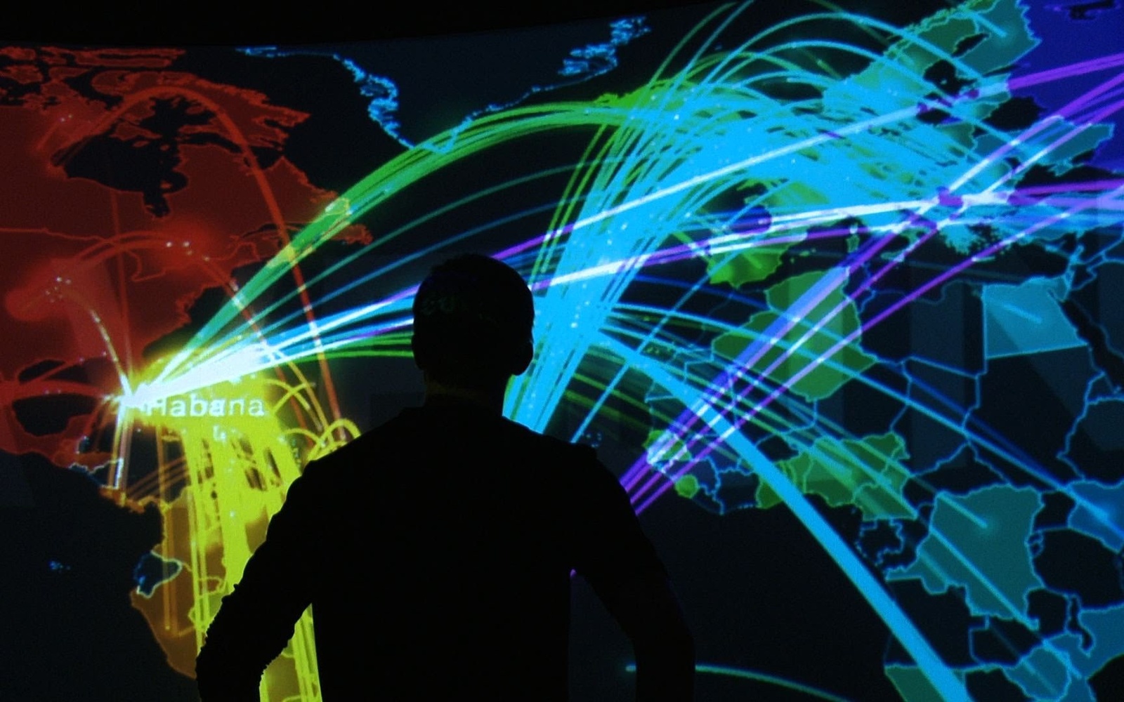 Shadow of a persons in front of a panorama screen which is showing trans_actions