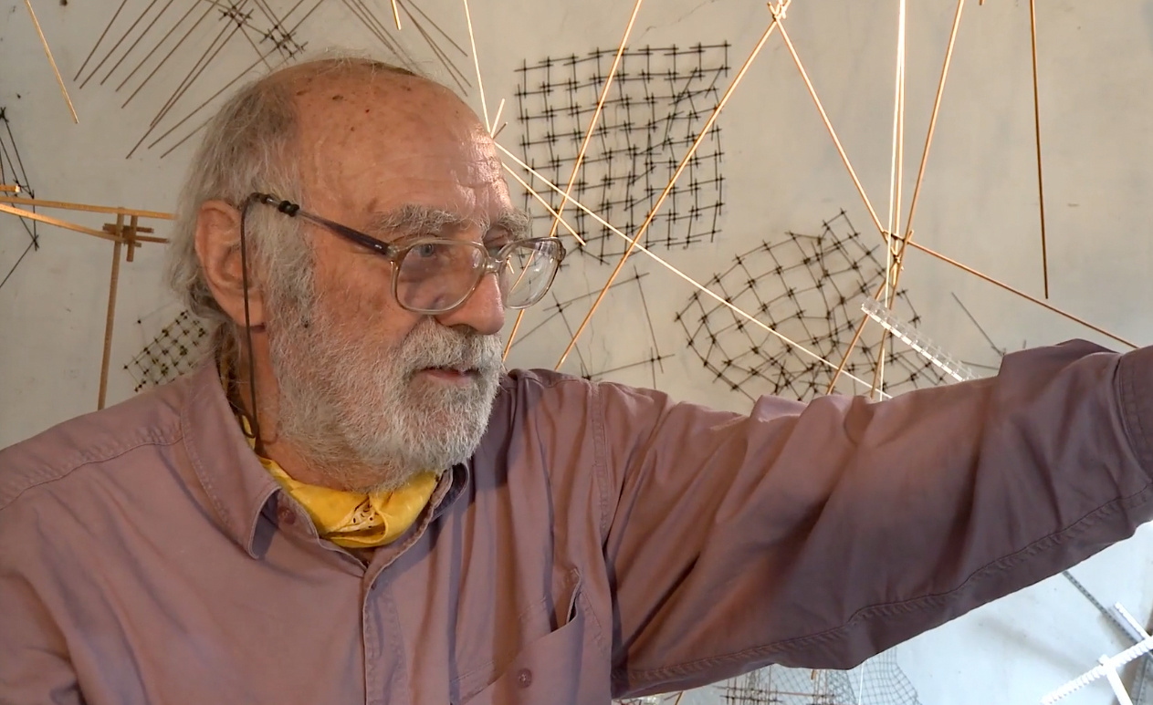 Portrait of Leonardo Mosso in his studio. 