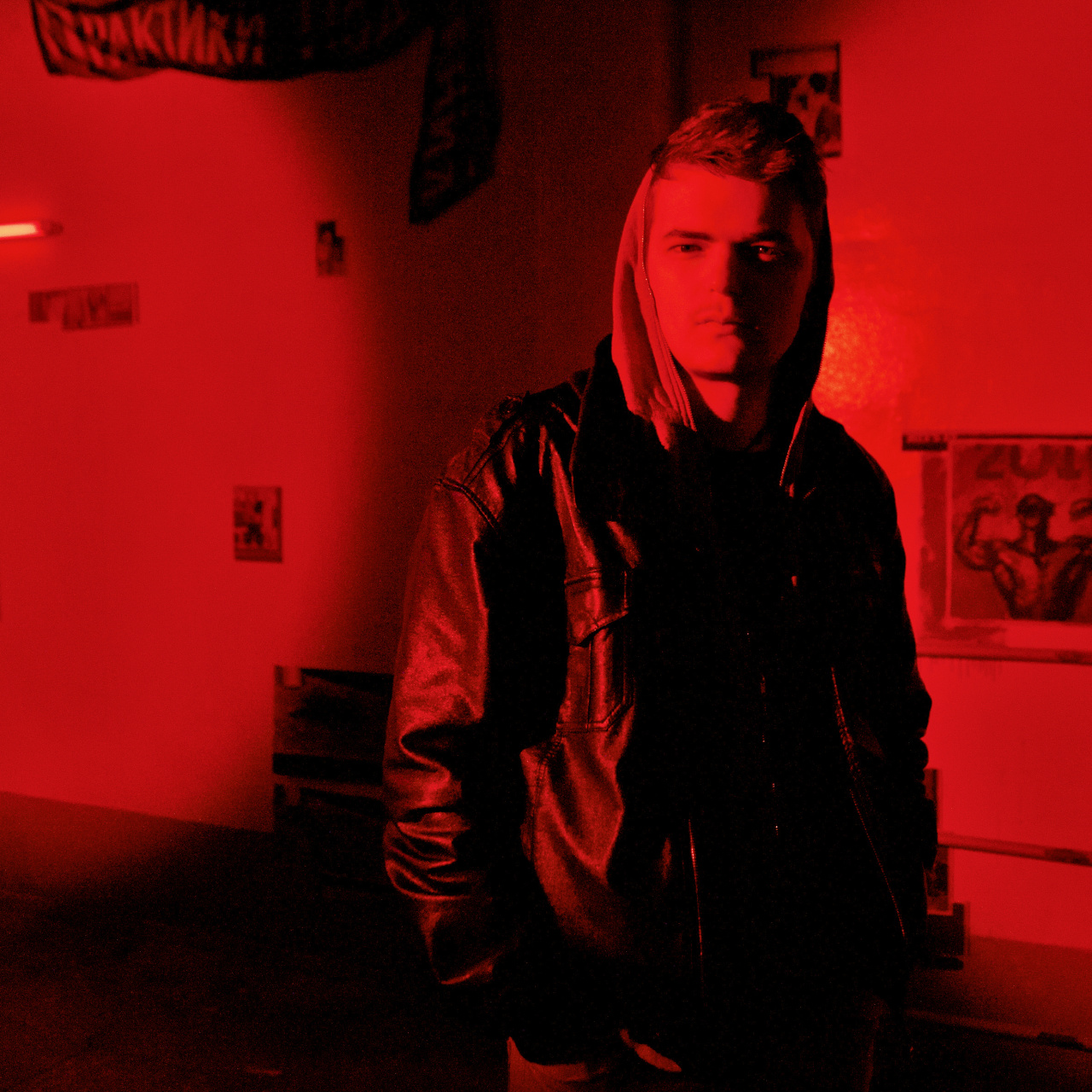 Red and black portrait of Sergey Shabohin.
