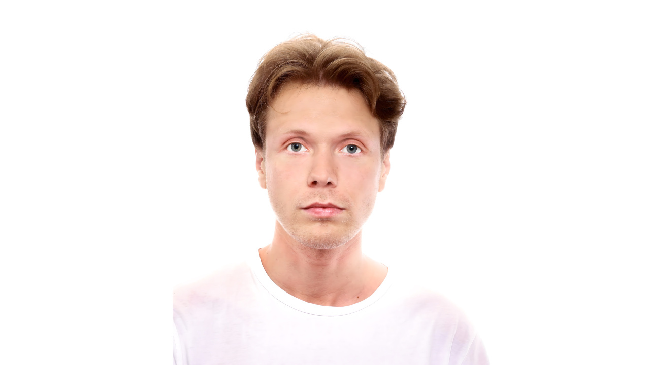 The portrait shows Russian artist Vasiliy Sumin in white T-shirt.