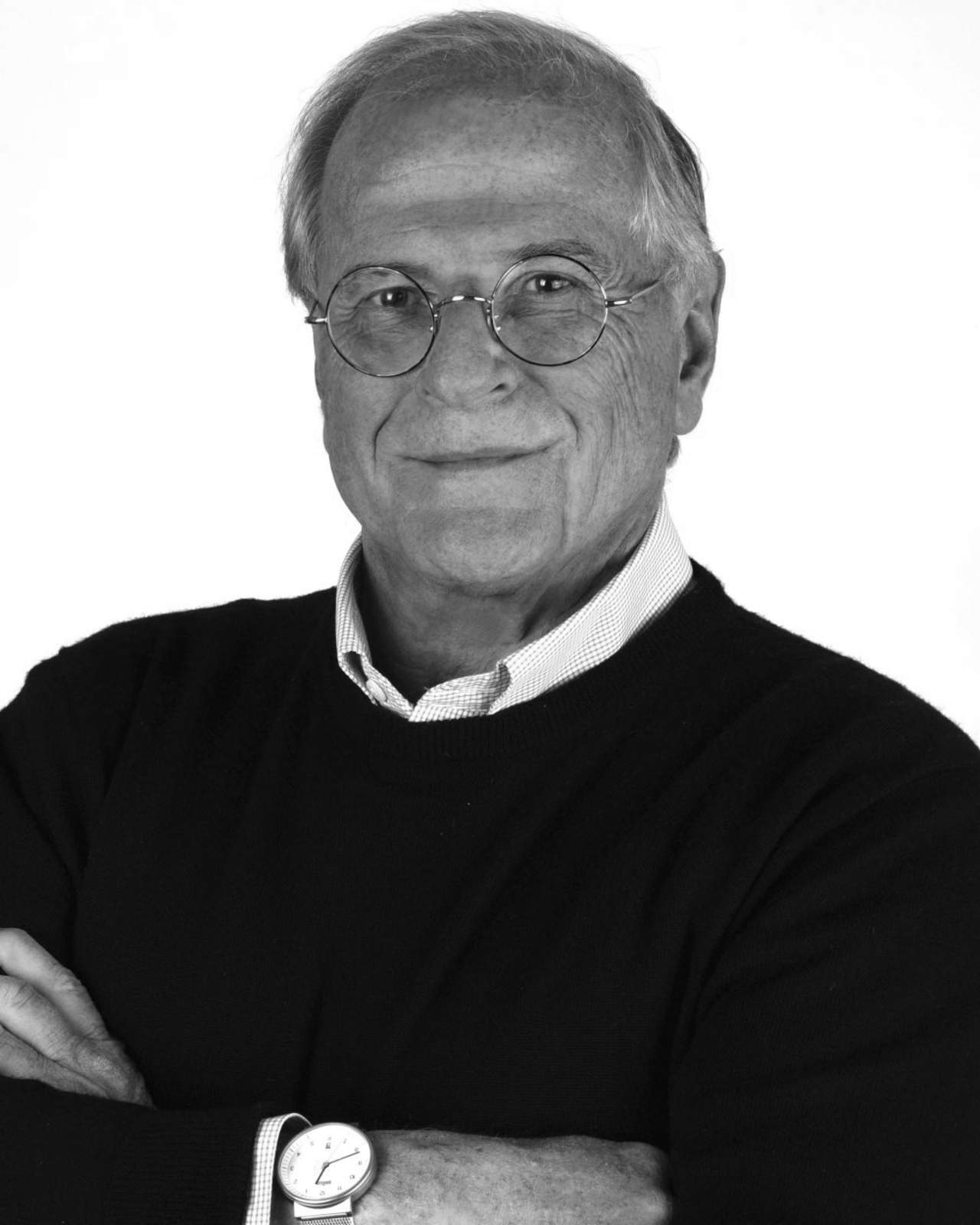 A portrait photo of Gordon Bruce is shown. 