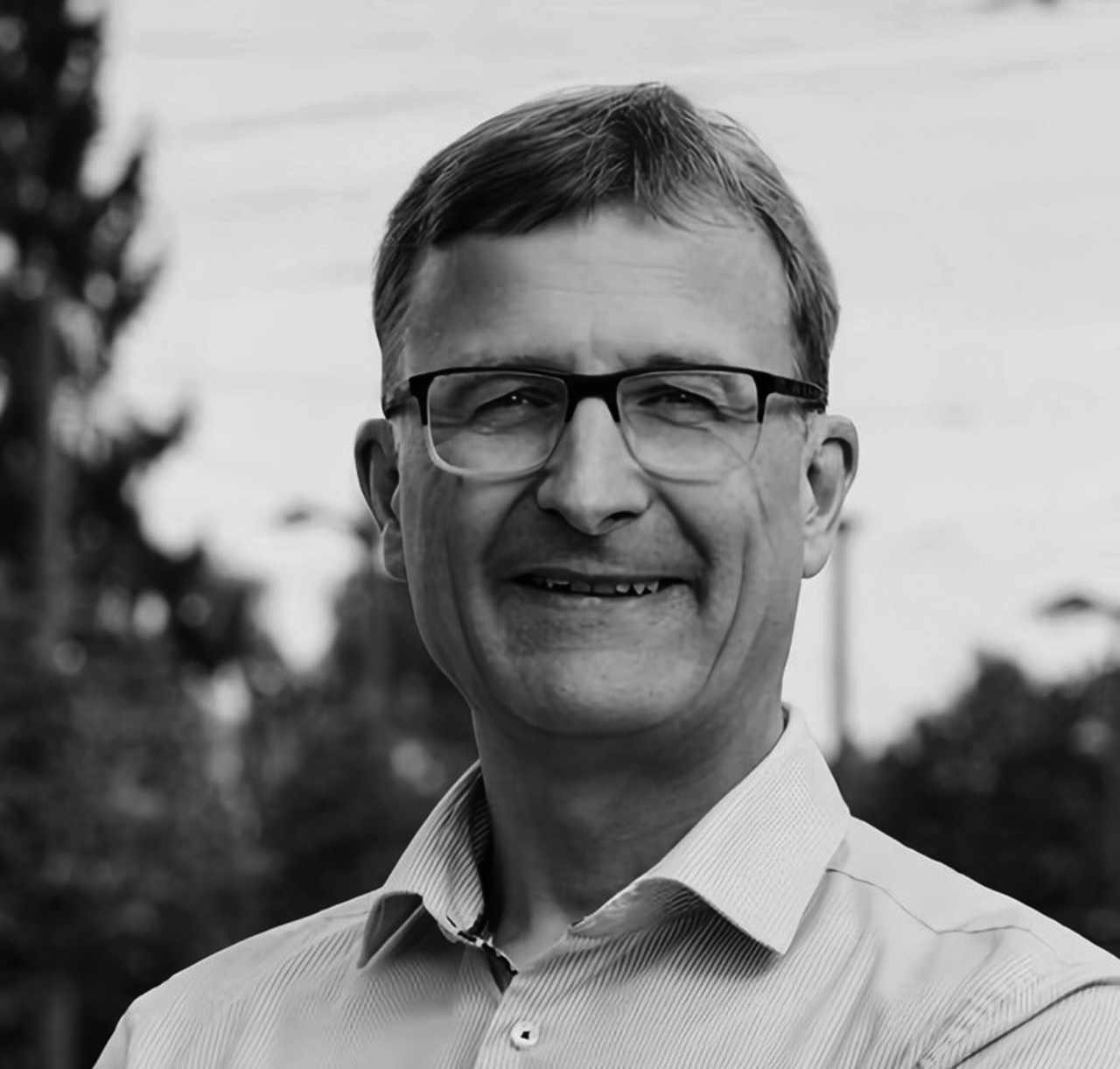 A portrait photo of Michael Beigl is shown. 