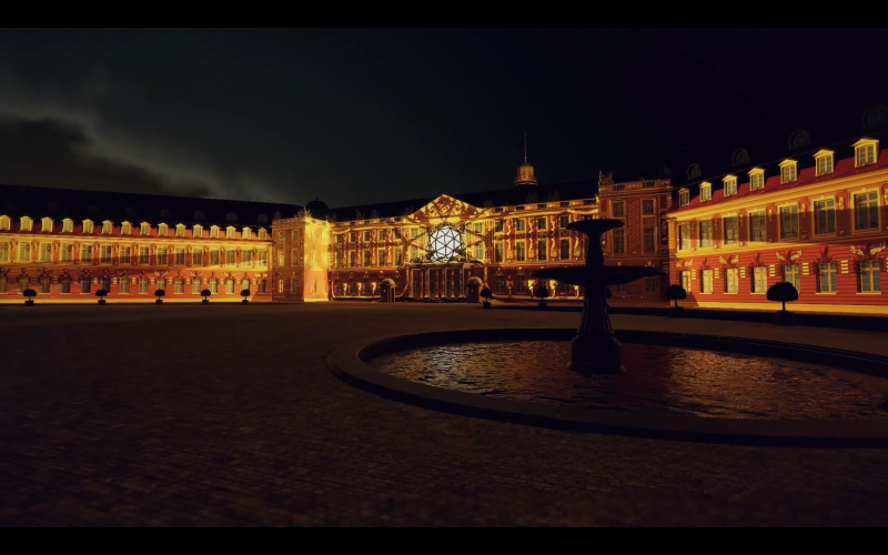 Das Karlsruher Schloss zeigt ein Kunstwerk aus Licht auf seiner Fassade. Es sieht realistisch aus, ist jedoch ein computergeneriertes Bild.