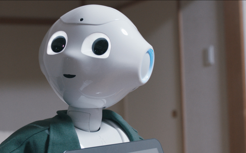 A little white robot with big eyes
