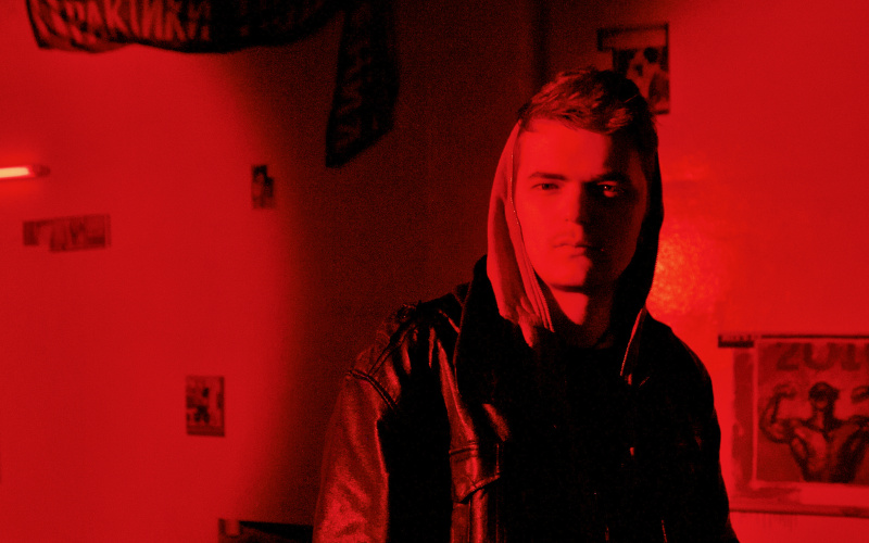 Red and black portrait of Sergey Shabohin.