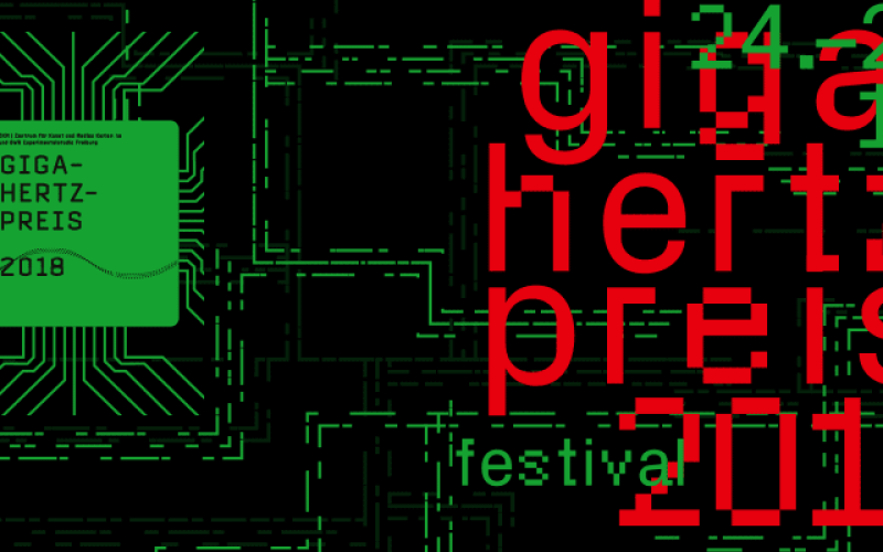 Giga-Hertz-Preis 2018 in roter Schrift auf grünem Hintergrund