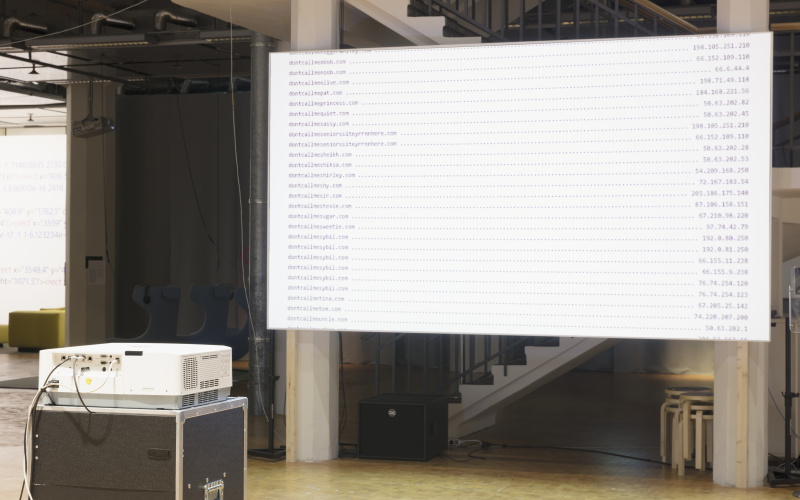 A white screen with beamer, on the screen there are different IP addresses.