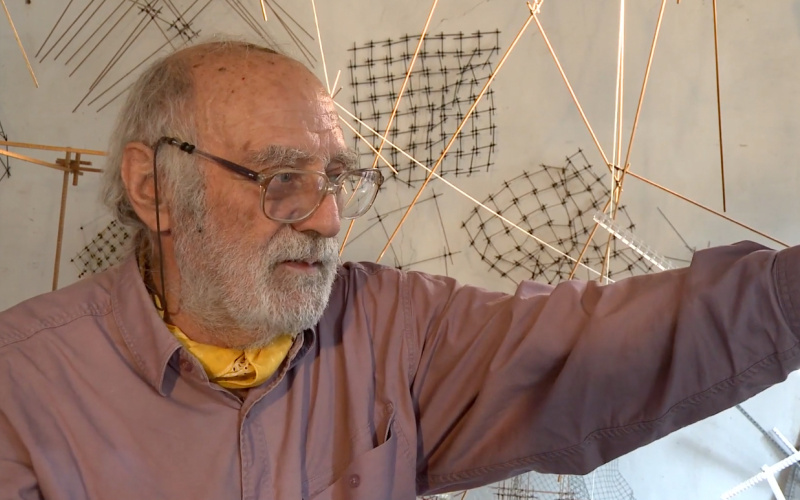 Portrait of Leonardo Mosso in his studio. 