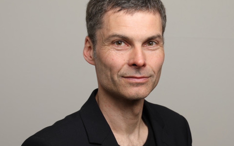 Portrait of Olaf Quantius in a black jacket