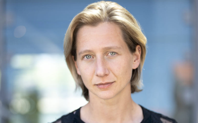 Portrait of a woman with chin-length blond hair.
