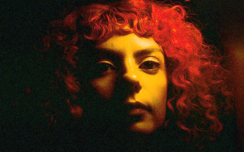 A portrait photo of a person is shown. 