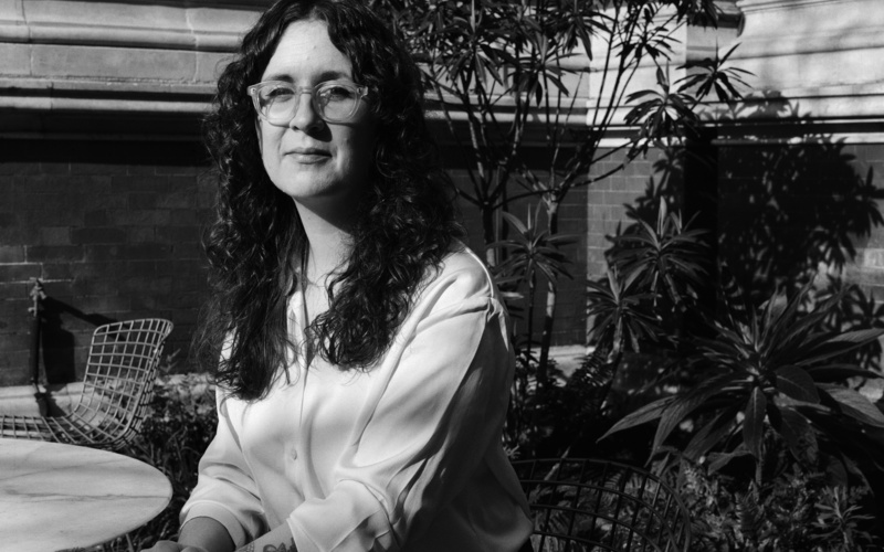 A portrait photo of Natalie D Kane is shown. 