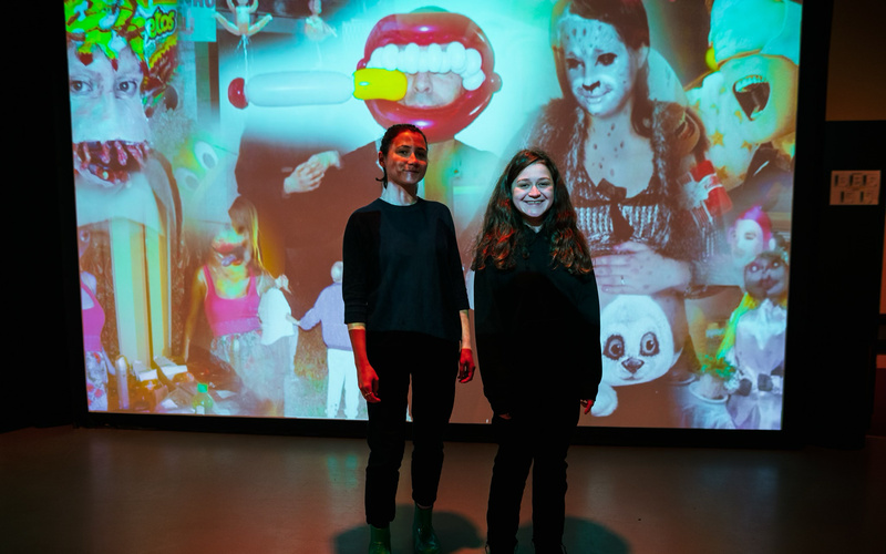 A portrait photo of the artist duo Rawlab is shown. 