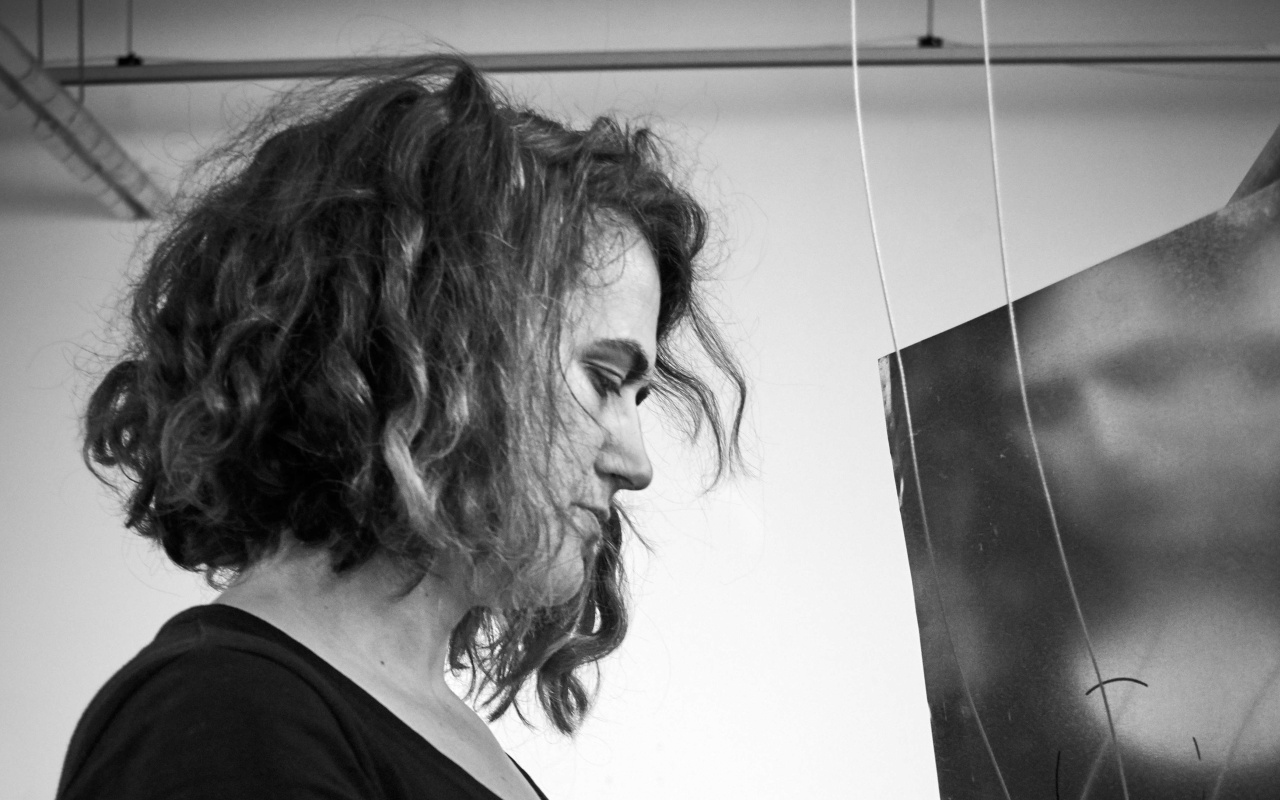 Silvia Rosani looks downwards.
