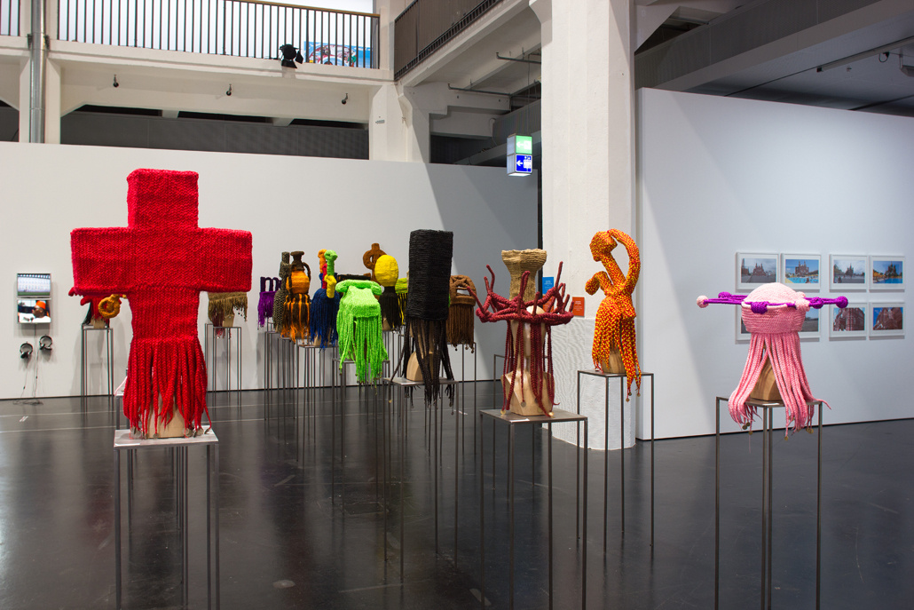 Symbols like a cross or telefon which were crocheted to synthetic hair wigs