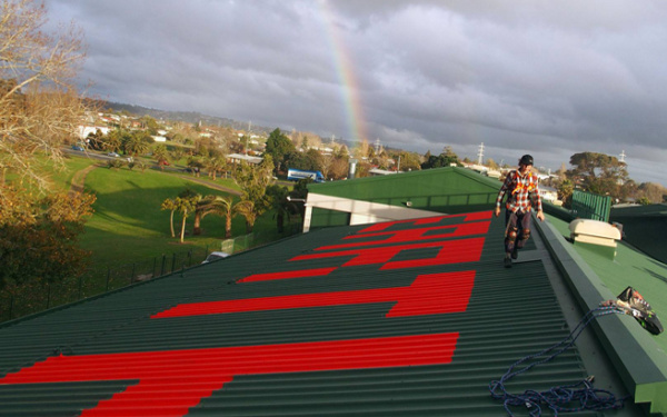 Earth in red letters on a roof