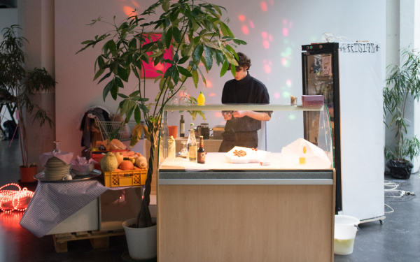 A man stands at a counter