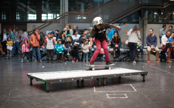 A girl riding the skateboard