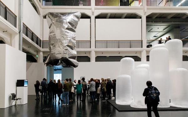 A huge cushion of aluminum hanging from the ceiling