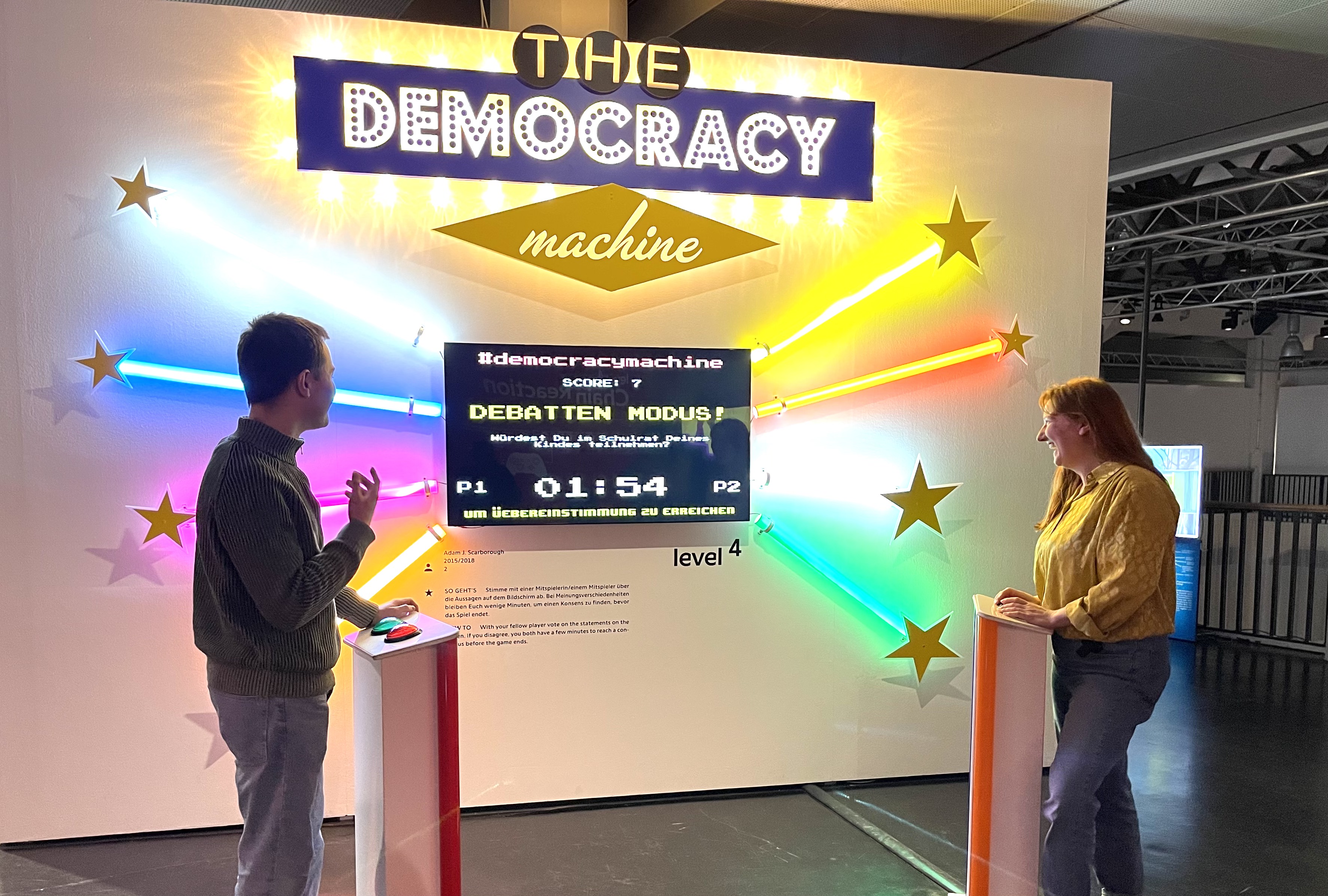 Two visitors in the exhibition »zkm_gameplay. the next level«