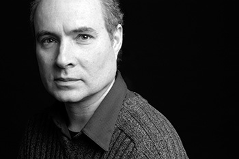 Black and white portrait of Gilles Gobeil