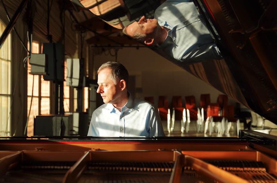 The picture shows a man playing the piano.
