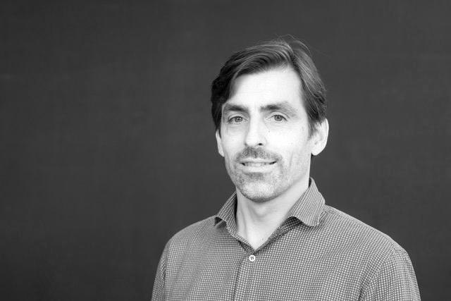 Black and white portrait of Kai Arras