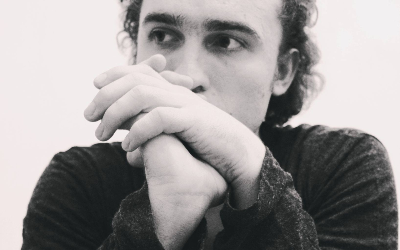 Black and white portrait of Yuri Akbalkan.