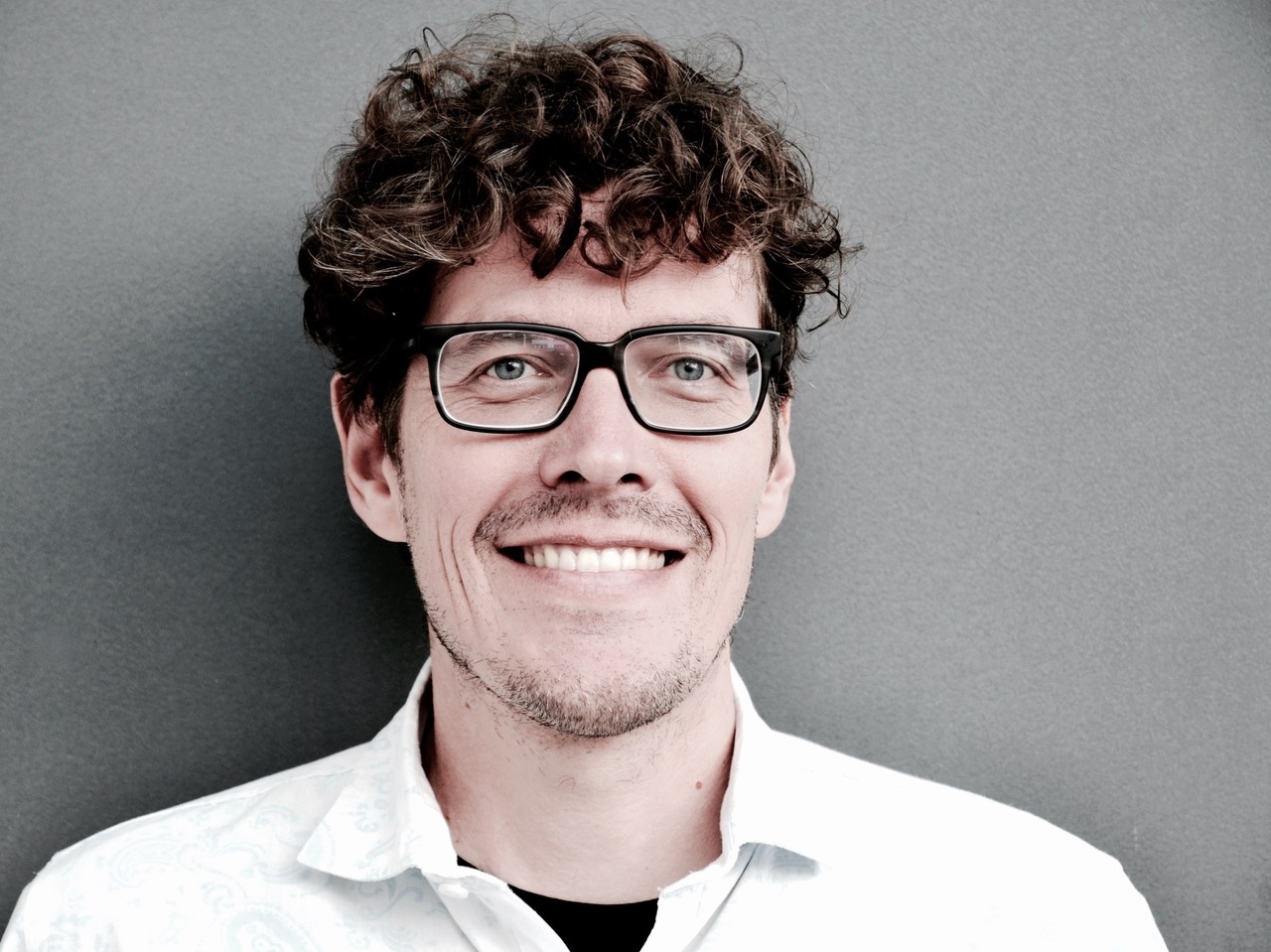 Zu sehen ist das Portraitfoto einer Person. 