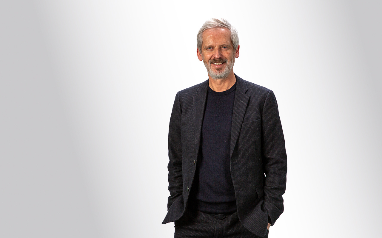 The picture shows Alistair Hudson. 