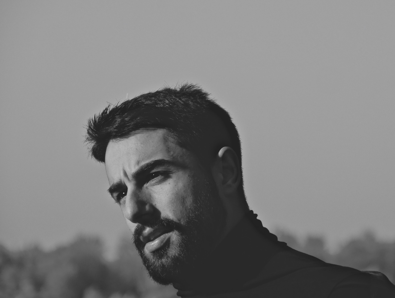Zu sehen ist das Portraitfoto einer Person. 