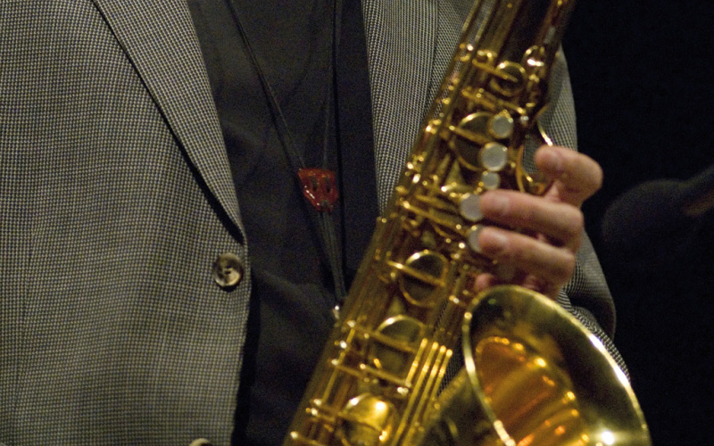 A man playing the saxophone.