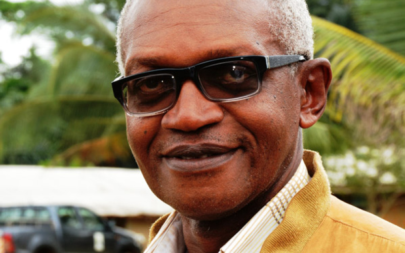 A portrait of Enoh Meyomesse