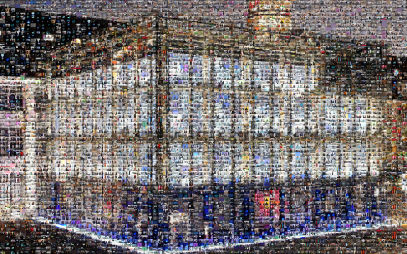 Das Foyer – von oben fotografiert – ist in einem violetten und grünen Licht getaucht. Es ist voller Leute, die essen und trinken