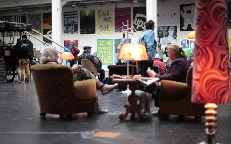 People are sitting on seating furniture