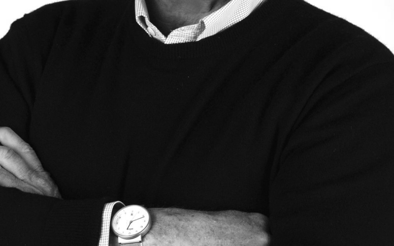 A portrait photo of Gordon Bruce is shown. 
