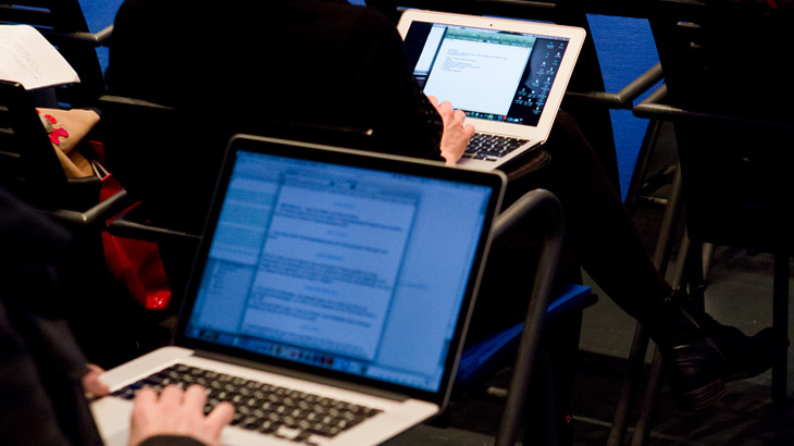 Persons working on their laptops