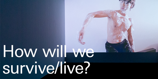 A man, wrapped in cling film, can be seen.