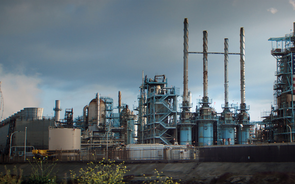 An industrial area with an American flag.