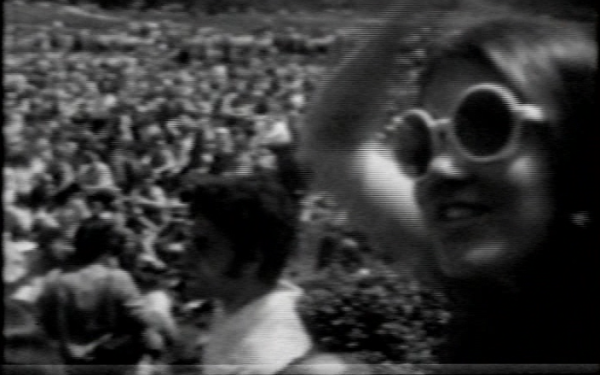 Video still from Paul Ryan's »Earth Day in New York City, Uptight in the Bushes« in black and white