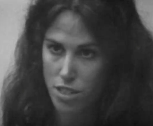 Video still from »Meeting at NYSCA« by the Raindance Foundation in black and white