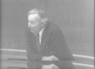 Video still from »Gregory Bateson Lecture« by the Raindance Foundation in black and white