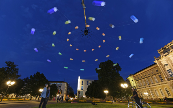 A huge colored centrifugal in Karlsruhe night sky