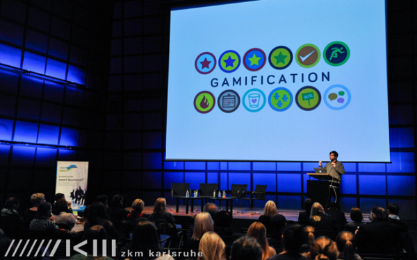 Menschen in einem Vortrag über "gamification"