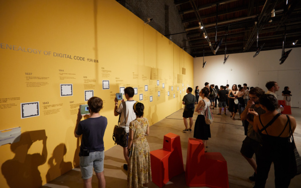 People in an exhibition space